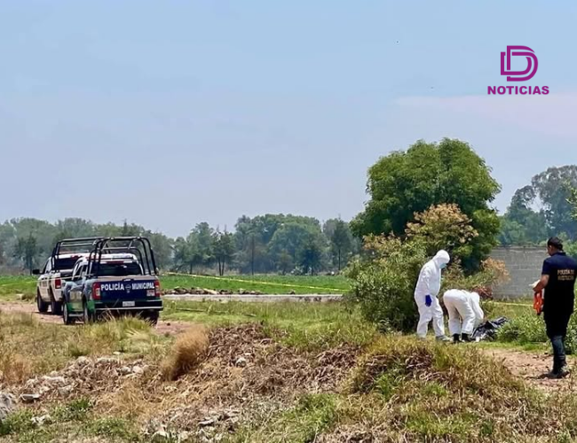 Autoridades acordonaron la zona donde fue localizada una bolsa con el cuerpo de un masculino en Tulancingo; el hallazgo ocurrió en San Nicolás el Grande.